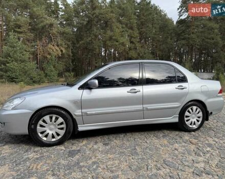 Серый Мицубиси Лансер, объемом двигателя 1.6 л и пробегом 200 тыс. км за 4400 $, фото 14 на Automoto.ua