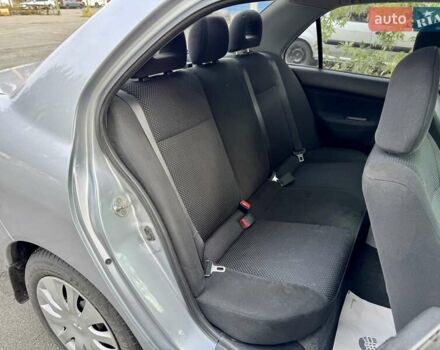 Сірий Міцубісі Lancer, об'ємом двигуна 1.58 л та пробігом 138 тис. км за 4990 $, фото 19 на Automoto.ua