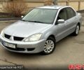 Серый Мицубиси Лансер, объемом двигателя 1.6 л и пробегом 193 тыс. км за 4300 $, фото 1 на Automoto.ua