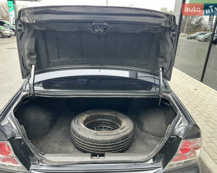 Сірий Міцубісі Lancer, об'ємом двигуна 1.6 л та пробігом 115 тис. км за 2800 $, фото 19 на Automoto.ua
