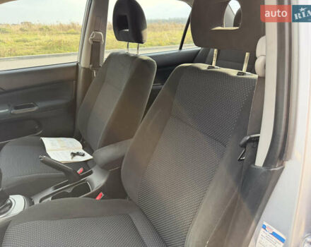 Серый Мицубиси Лансер, объемом двигателя 1.3 л и пробегом 160 тыс. км за 5555 $, фото 36 на Automoto.ua