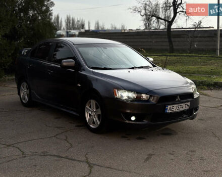 Сірий Міцубісі Lancer, об'ємом двигуна 2 л та пробігом 220 тис. км за 6800 $, фото 10 на Automoto.ua