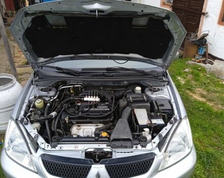 Сірий Міцубісі Lancer, об'ємом двигуна 1 л та пробігом 400 тис. км за 2850 $, фото 6 на Automoto.ua