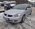 Сірий Міцубісі Lancer, об'ємом двигуна 1.6 л та пробігом 245 тис. км за 3999 $, фото 1 на Automoto.ua