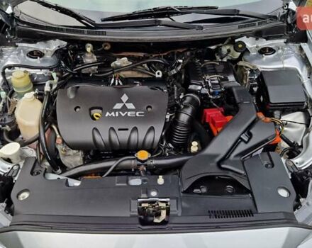 Серый Мицубиси Лансер, объемом двигателя 2 л и пробегом 213 тыс. км за 6550 $, фото 26 на Automoto.ua