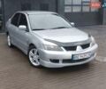 Сірий Міцубісі Lancer, об'ємом двигуна 2 л та пробігом 230 тис. км за 3650 $, фото 1 на Automoto.ua