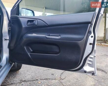 Сірий Міцубісі Lancer, об'ємом двигуна 1.58 л та пробігом 122 тис. км за 6300 $, фото 37 на Automoto.ua