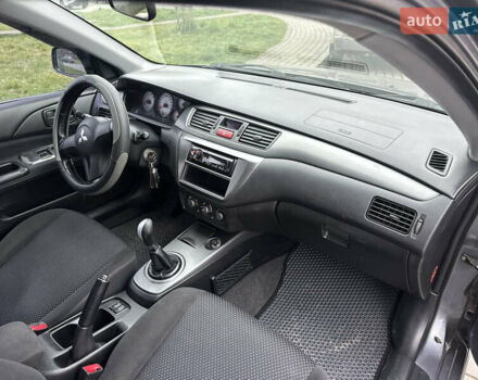 Сірий Міцубісі Lancer, об'ємом двигуна 1.6 л та пробігом 177 тис. км за 2800 $, фото 32 на Automoto.ua