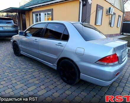 Сірий Міцубісі Lancer, об'ємом двигуна 1.6 л та пробігом 280 тис. км за 5000 $, фото 4 на Automoto.ua