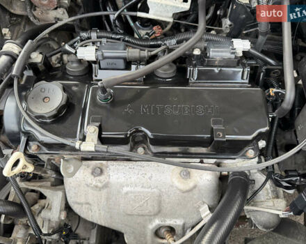 Серый Мицубиси Лансер, объемом двигателя 1.3 л и пробегом 160 тыс. км за 5555 $, фото 77 на Automoto.ua