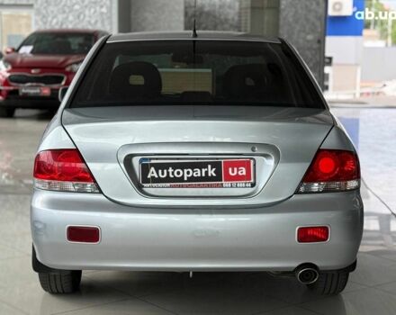 Серый Мицубиси Лансер, объемом двигателя 1.6 л и пробегом 174 тыс. км за 5990 $, фото 5 на Automoto.ua