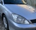 Сірий Міцубісі Lancer, об'ємом двигуна 1.6 л та пробігом 248 тис. км за 3000 $, фото 1 на Automoto.ua