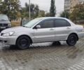 Серый Мицубиси Лансер, объемом двигателя 1.6 л и пробегом 300 тыс. км за 3250 $, фото 15 на Automoto.ua