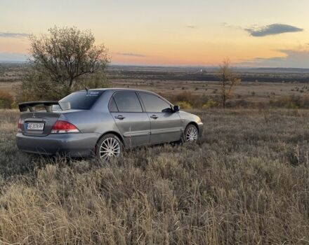 Серый Мицубиси Лансер, объемом двигателя 1.6 л и пробегом 250 тыс. км за 3999 $, фото 20 на Automoto.ua