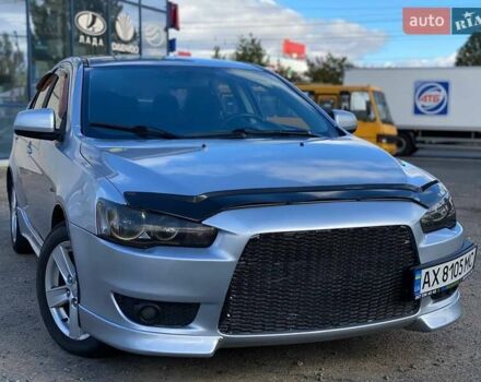Серый Мицубиси Лансер, объемом двигателя 2 л и пробегом 150 тыс. км за 6100 $, фото 3 на Automoto.ua