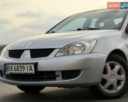 Серый Мицубиси Лансер, объемом двигателя 1.3 л и пробегом 160 тыс. км за 5555 $, фото 2 на Automoto.ua