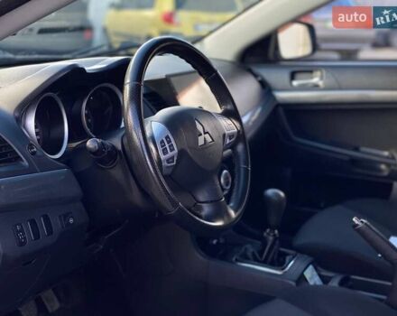 Серый Мицубиси Лансер, объемом двигателя 2 л и пробегом 150 тыс. км за 6100 $, фото 11 на Automoto.ua