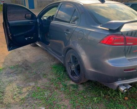 Серый Мицубиси Лансер, объемом двигателя 2 л и пробегом 351 тыс. км за 7000 $, фото 3 на Automoto.ua