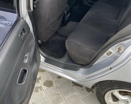 Серый Мицубиси Лансер, объемом двигателя 1.6 л и пробегом 263 тыс. км за 2350 $, фото 4 на Automoto.ua