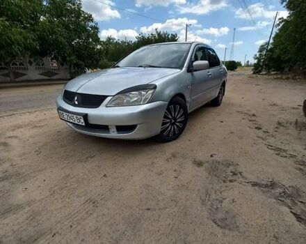 Сірий Міцубісі Lancer, об'ємом двигуна 1.58 л та пробігом 416 тис. км за 3100 $, фото 8 на Automoto.ua
