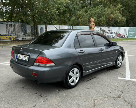Сірий Міцубісі Lancer, об'ємом двигуна 1.58 л та пробігом 176 тис. км за 4700 $, фото 2 на Automoto.ua