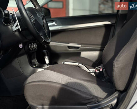 Сірий Міцубісі Lancer, об'ємом двигуна 2 л та пробігом 220 тис. км за 6800 $, фото 23 на Automoto.ua