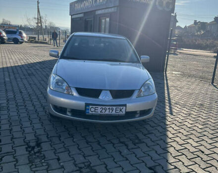 Серый Мицубиси Лансер, объемом двигателя 1.58 л и пробегом 178 тыс. км за 3300 $, фото 4 на Automoto.ua