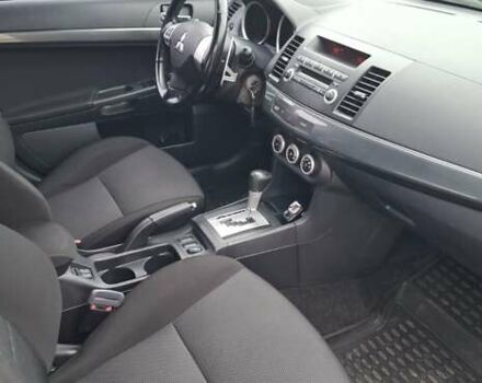 Серый Мицубиси Лансер, объемом двигателя 2 л и пробегом 189 тыс. км за 6800 $, фото 6 на Automoto.ua