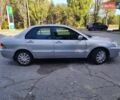 Сірий Міцубісі Lancer, об'ємом двигуна 1.58 л та пробігом 122 тис. км за 6300 $, фото 21 на Automoto.ua