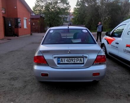 Серый Мицубиси Лансер, объемом двигателя 1.6 л и пробегом 302 тыс. км за 3200 $, фото 2 на Automoto.ua