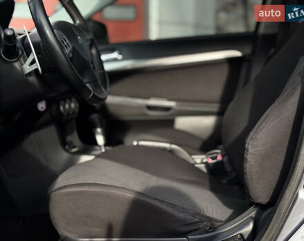 Сірий Міцубісі Lancer, об'ємом двигуна 2 л та пробігом 220 тис. км за 6800 $, фото 17 на Automoto.ua