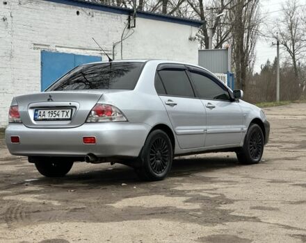 Серый Мицубиси Лансер, объемом двигателя 1.6 л и пробегом 298 тыс. км за 3600 $, фото 4 на Automoto.ua