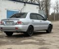 Серый Мицубиси Лансер, объемом двигателя 1.6 л и пробегом 298 тыс. км за 3600 $, фото 4 на Automoto.ua