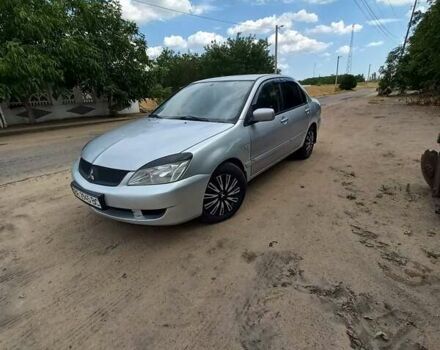Сірий Міцубісі Lancer, об'ємом двигуна 1.58 л та пробігом 416 тис. км за 3100 $, фото 15 на Automoto.ua