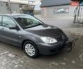 Сірий Міцубісі Lancer, об'ємом двигуна 1.6 л та пробігом 330 тис. км за 3500 $, фото 17 на Automoto.ua