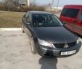 Сірий Міцубісі Lancer, об'ємом двигуна 1.6 л та пробігом 188 тис. км за 160000 $, фото 10 на Automoto.ua