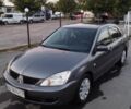 Сірий Міцубісі Lancer, об'ємом двигуна 1.6 л та пробігом 178 тис. км за 5464 $, фото 1 на Automoto.ua