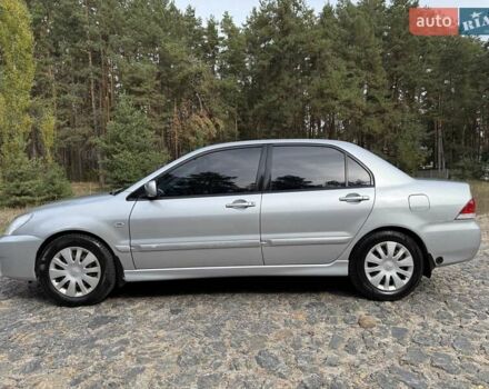 Серый Мицубиси Лансер, объемом двигателя 1.6 л и пробегом 200 тыс. км за 4400 $, фото 13 на Automoto.ua