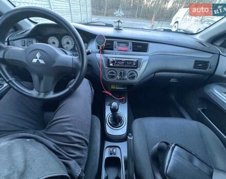 Серый Мицубиси Лансер, объемом двигателя 1.6 л и пробегом 256 тыс. км за 4500 $, фото 6 на Automoto.ua