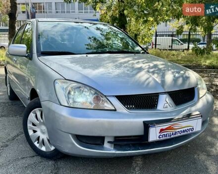 Сірий Міцубісі Lancer, об'ємом двигуна 1.58 л та пробігом 138 тис. км за 4990 $, фото 2 на Automoto.ua