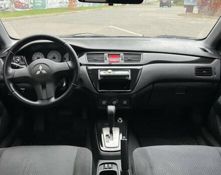 Сірий Міцубісі Lancer, об'ємом двигуна 1.58 л та пробігом 176 тис. км за 4700 $, фото 8 на Automoto.ua