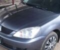 Сірий Міцубісі Lancer, об'ємом двигуна 1.58 л та пробігом 400 тис. км за 5000 $, фото 1 на Automoto.ua