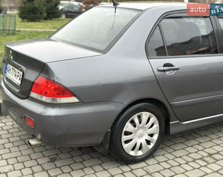 Сірий Міцубісі Lancer, об'ємом двигуна 1.6 л та пробігом 177 тис. км за 2800 $, фото 8 на Automoto.ua