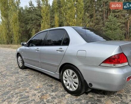 Серый Мицубиси Лансер, объемом двигателя 1.6 л и пробегом 200 тыс. км за 4400 $, фото 10 на Automoto.ua