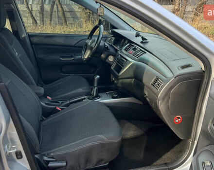 Серый Мицубиси Лансер, объемом двигателя 1.58 л и пробегом 290 тыс. км за 3750 $, фото 7 на Automoto.ua