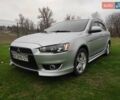 Сірий Міцубісі Lancer, об'ємом двигуна 2 л та пробігом 124 тис. км за 7499 $, фото 1 на Automoto.ua