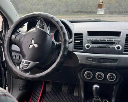 Серый Мицубиси Лансер, объемом двигателя 2 л и пробегом 207 тыс. км за 5800 $, фото 16 на Automoto.ua