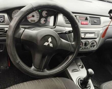 Серый Мицубиси Лансер, объемом двигателя 1.6 л и пробегом 181 тыс. км за 4500 $, фото 9 на Automoto.ua
