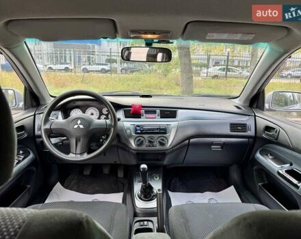 Сірий Міцубісі Lancer, об'ємом двигуна 1.58 л та пробігом 138 тис. км за 4990 $, фото 20 на Automoto.ua