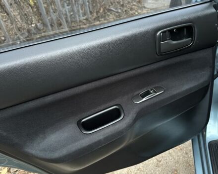 Серый Мицубиси Лансер, объемом двигателя 1.6 л и пробегом 238 тыс. км за 4300 $, фото 4 на Automoto.ua